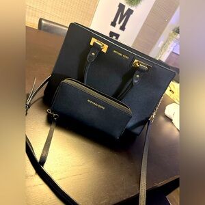 Black Michael Kors purse and matching wallet